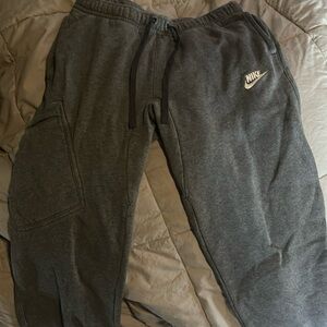 small grey nike sweatpants are so loose fitted and comfortable